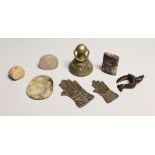 A BELL SEAL, TWO ISLAMIC HANDS, TWO SEALS AND THREE VARIOUS PIECES.