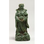 A CHINESE JADEITE STANDING FIGURE OF A SAGE 8ins high