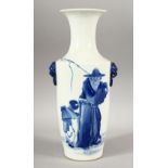 A CHINESE BLUE & WHITE PORCELAIN FISHERMAN VASE - the body depicting fisherman - with twin lion