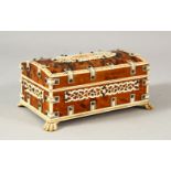 A SMALL VISAKHAPATNAM TORTOISESHELL AND IVORY SANDLEWOOD CASKET, stood on four carved ivory claw