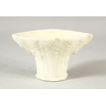 A CHINESE BLANC DE CHINE / DEHUA PORCELAIN LIBATION CUP - with moulded floral decoration,10.5cm