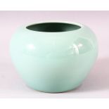 A GOOD CHINESE CELADON GLAZED VASE, the base with blue six character mark, 9.5cm high.