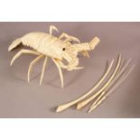 A JAPANESE CARVED IVORY RETICULATED MODEL OF A CRAYFISH, 29cm long.