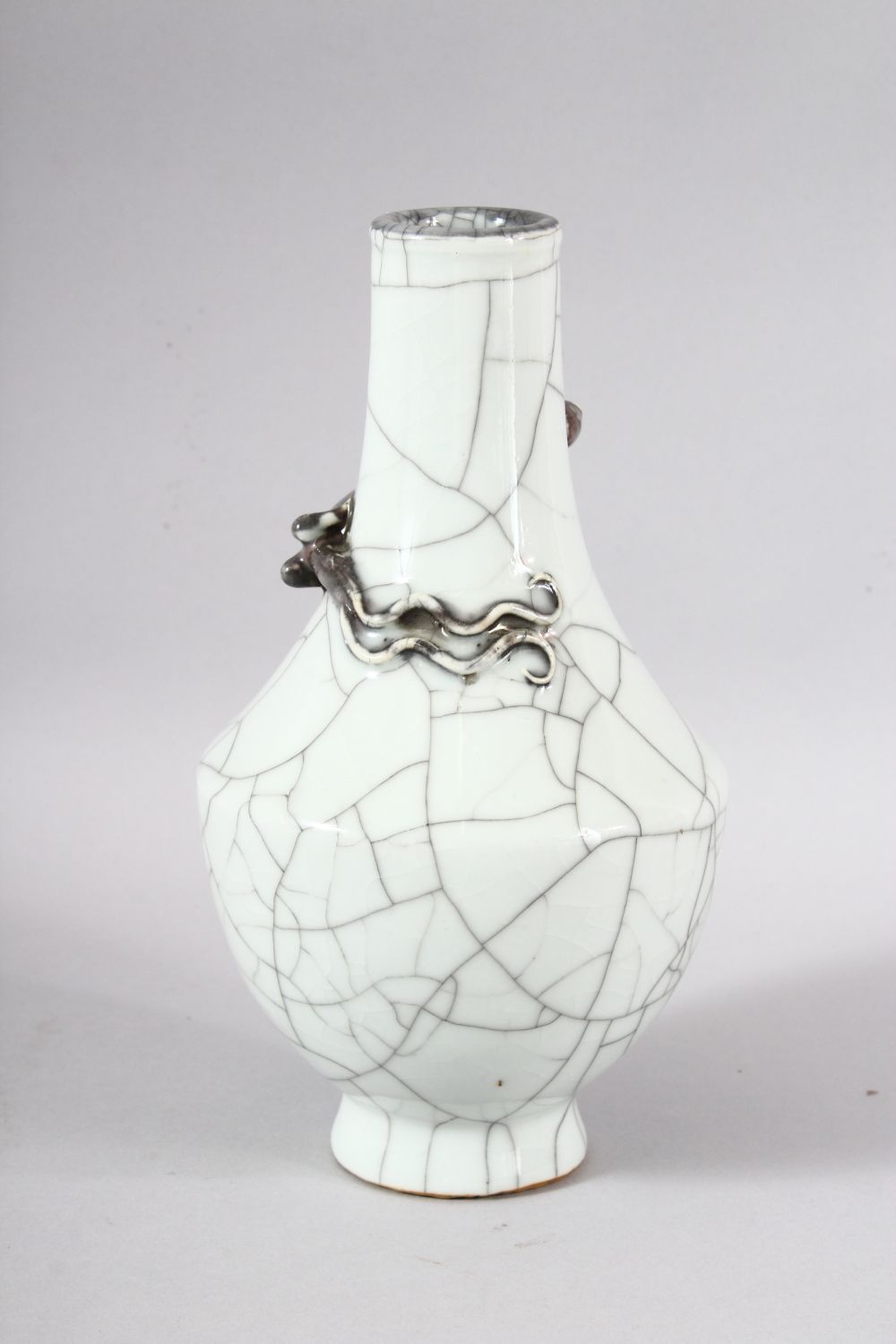 A GOOD CHINESE CRACKLE GLAZED VASE, with moulded dragon to the neck, 23cm high. - Image 3 of 7