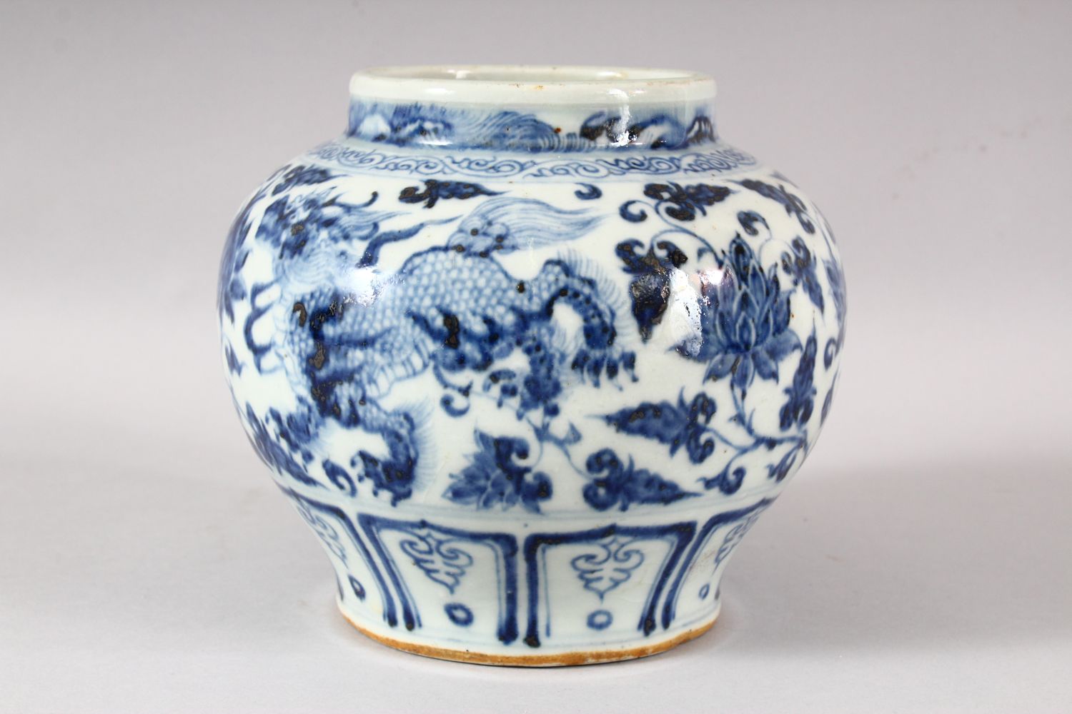 A CHINESE BLUE AND WHITE GLAZED POTTERY VASE, the body painted with kylin and stylised flora, 15.5cm - Image 2 of 6