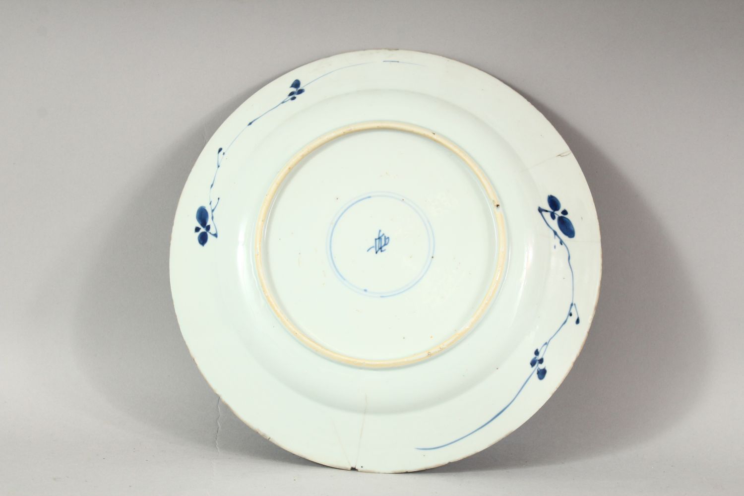 A CHINESE BLUE AND WHITE PORCELAIN DISH, decorated with flowers, 26.5cm diameter. - Image 2 of 3