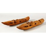 A PAIR OF CHINESE CARVED BAMBOO BOATS, both 28cm long.