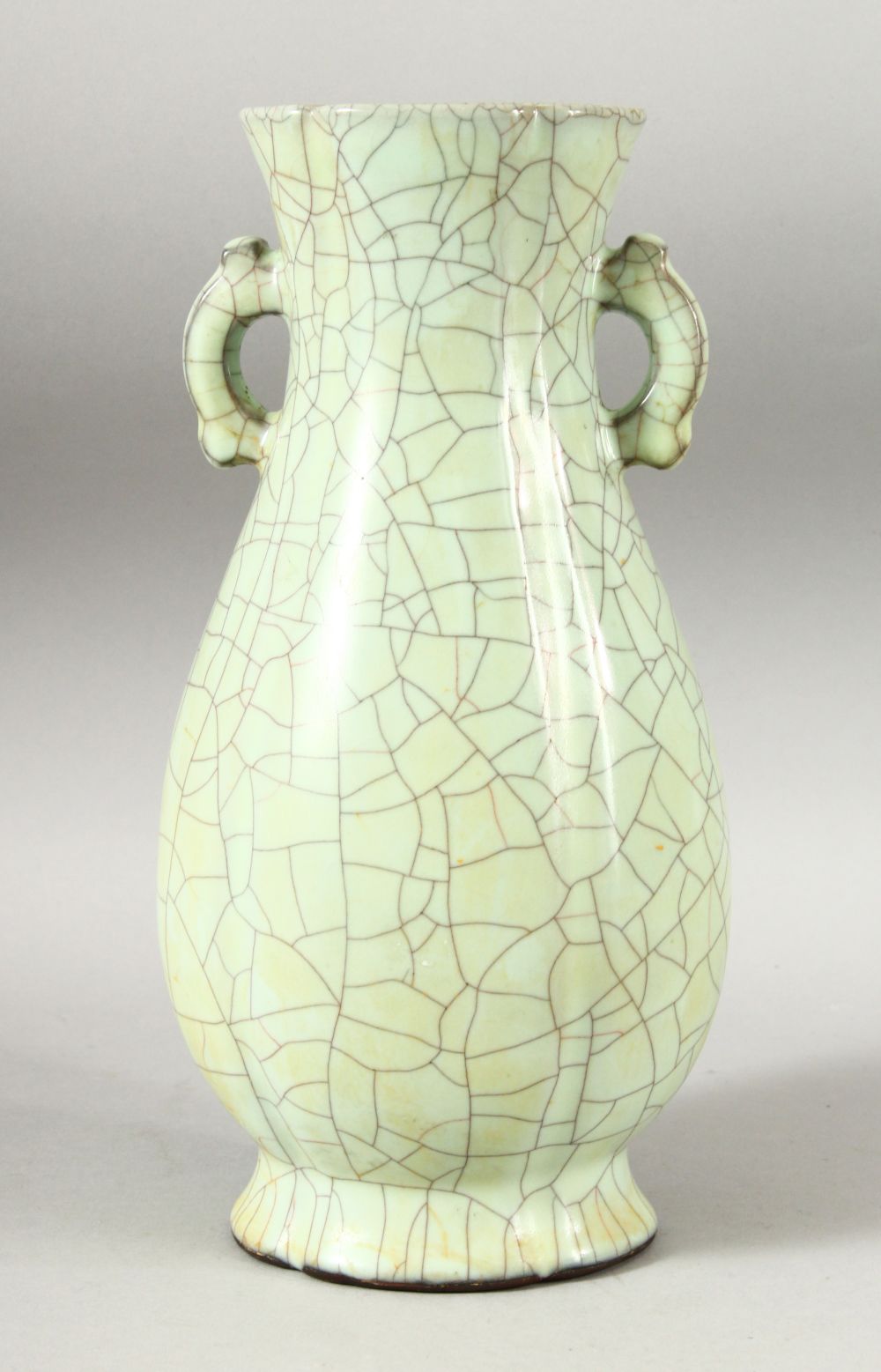 A CHINESE CELADON CRACKLE GLAZE TWIN HANDLE VASE, 28.5cm high.