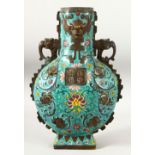 A LARGE CHINESE CLOISONNE BRONZE TWIN HANDLE MOONFLASK, with elephant formed handles and calligraphy