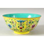 A CHINESE FAMILLE JAUNE PORCELAIN BOWL, the interior with turquoise ground, the exterior painted