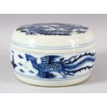 A CHINESE BLUE AND WHITE PORCELAIN CIRCULAR BOX AND COVER, the exterior painted with phoenix, the