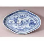 A CHINESE BLUE & WHITE PORCELAIN LANDSCAPE DISH - 19cm wide.