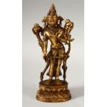 A SINO - TIBETAN GILT BRONZE FIGURE OF BUDDHA / DEITY - 18.5CM