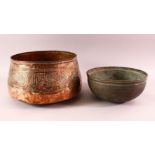 TWO EARLY MAMLUK COPPER BOWLS, each with engraved decoration, 25cm and 28cm diameter.