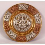 A FINE 19TH CENTURY SOUTH INDIAN TANJORE SILVER AND COPPER INLAID BRASS DISH depicting Hindu gods,