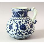 A CHINESE MING STYLE BLUE AND WHITE WINE JAR, decorated with lotus flowers, the handle in the form