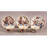 A MIXED LOT OF THREE CHINESE IMARI TEA BOWLS & SAUCERS - Each decorated in similar style with