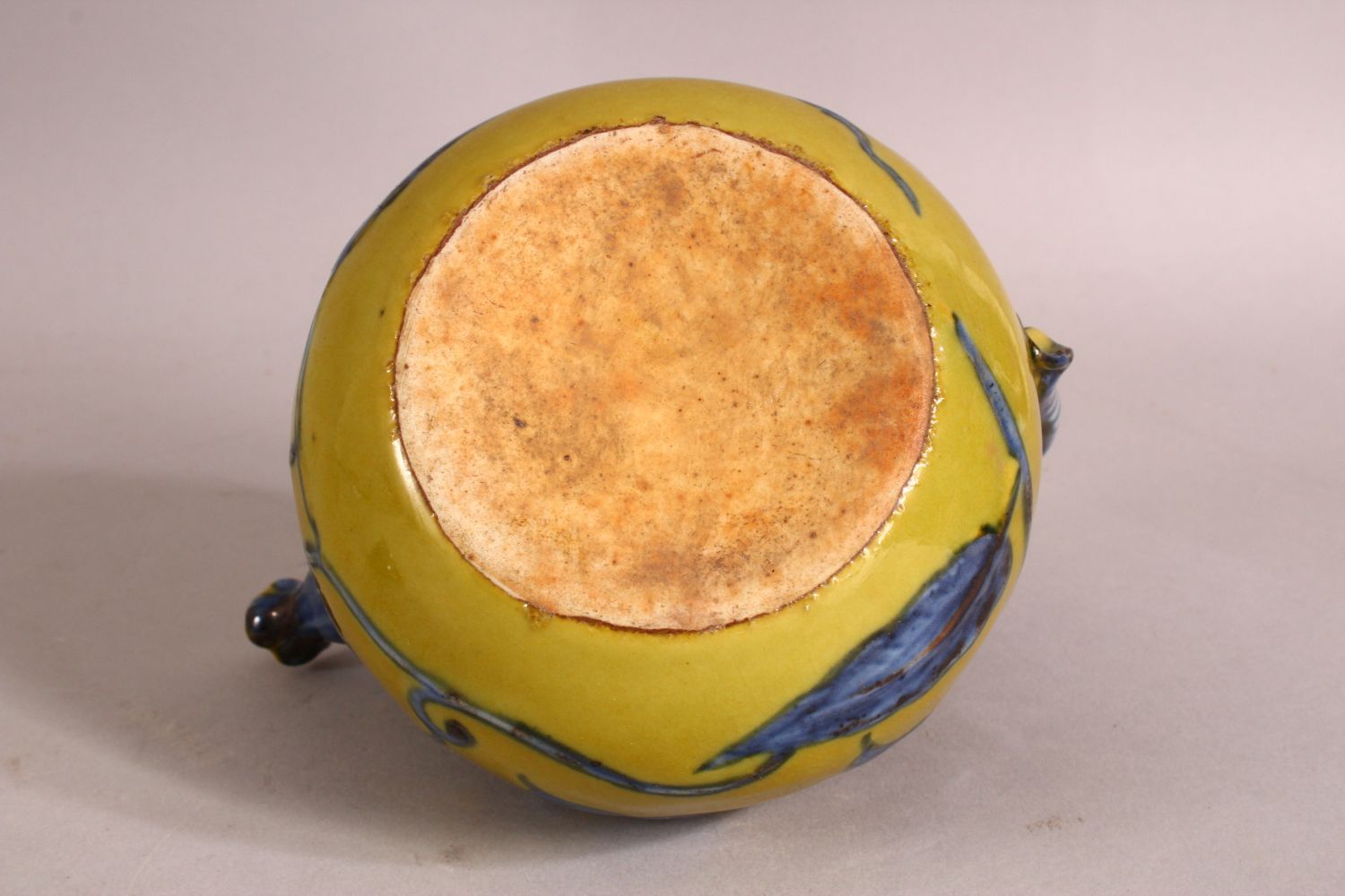 A CHINESE YELLOW GROUND GLAZED POTTERY TEAPOT AND COVER, the body with blue floral decoration, - Image 6 of 6