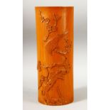 A CHINESE CARVED BAMBOO BRUSH POT - decorated with scenes of birds upon tree branches, 28cm