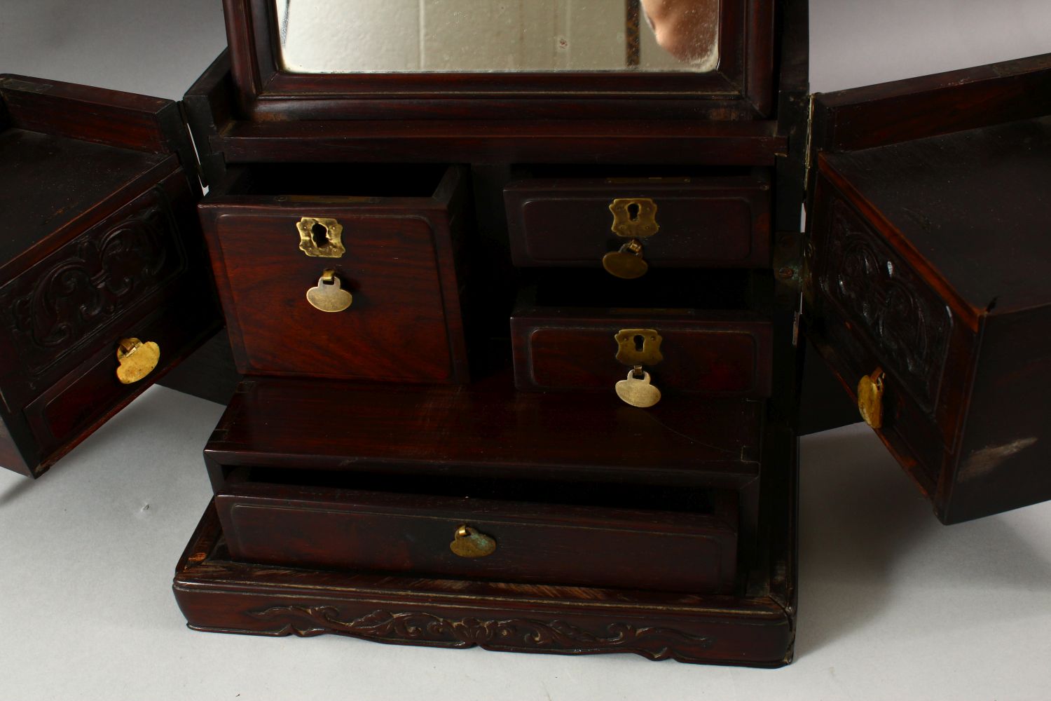 A LARGE CHINESE POSSIBLY ZITAN WOOD COSMETIC BOX, comprising a hinged rising mirror, six drawers and - Image 2 of 9