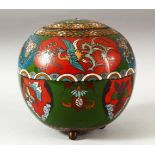 A CHINESE CLOISONNE JAR AND COVER, decorated with phoenix and floral motifs, supported on three