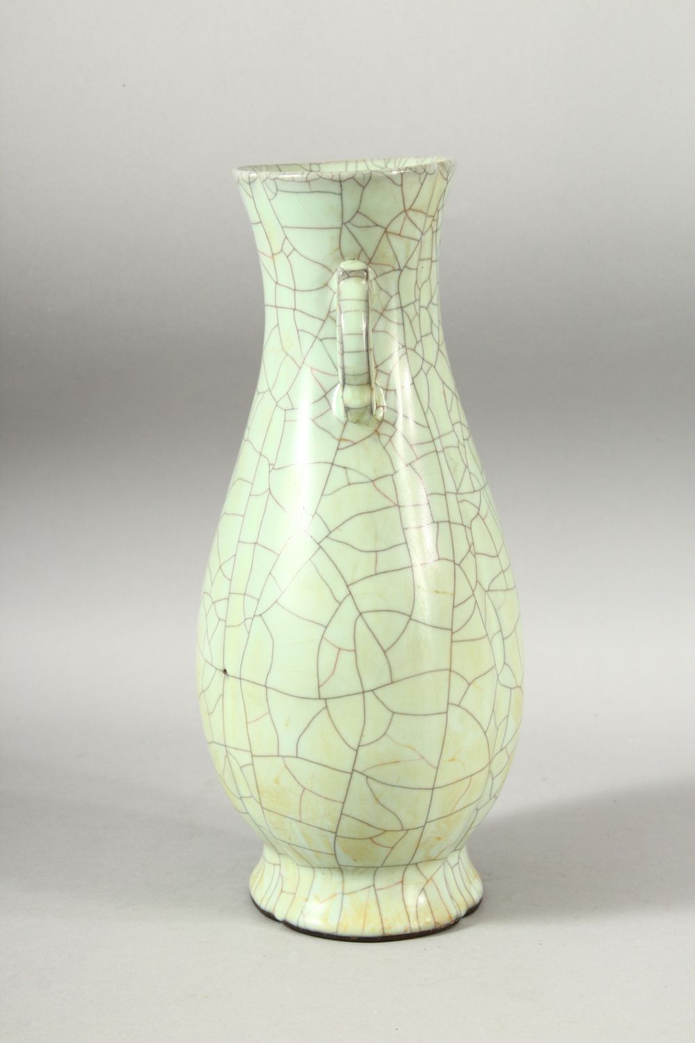 A CHINESE CELADON CRACKLE GLAZE TWIN HANDLE VASE, 28.5cm high. - Image 2 of 6