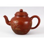 A CHINESE YIXING TEAPOT, the body with calligraphy script, the base with impressed mark, 20cm handle