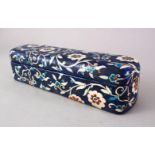 A GOOD 19TH CENTURY TURKISH KUTAHYA PORCELAIN LIDDED PEN BOX, the box with a blue ground and