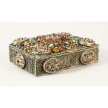 A 19TH CENTURY INDIAN WHITE METAL & SEMI PRECIOUS STONE INLAID BOX - the box inlaid with a variety