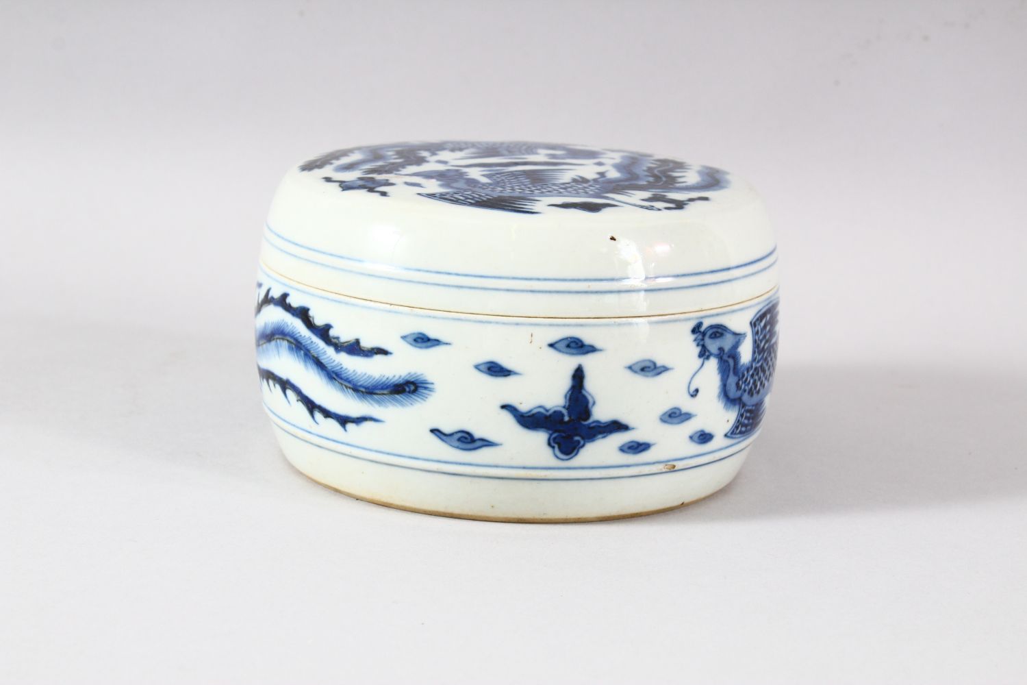 A CHINESE BLUE AND WHITE PORCELAIN CIRCULAR BOX AND COVER, the exterior painted with phoenix, the - Image 2 of 9