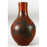 AN UNUSUAL JAPANESE LACQUERED PORCELAIN VASE, the body with fine gilt work decoration depicting a