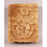 AN INDIAN ALABASTER RECTANGULAR BOX AND COVER, the lid carved with flower, 11cm x 8.5cm.