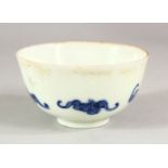 A CHINESE PORCELAIN TEA BOWL, painted in blue depicting bats, 8cm diameter.