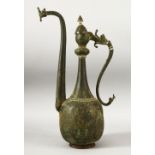 A LARGE 18TH CENTURY SAFAVID TINNED COPPER EWER, with dragon shaped spout and handle, 40cm high.