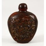 A CHINESE HORN SNUFF BOTTLE AND STOPPER, carved with two panels with a sage, deer and bats, 7.5cm.