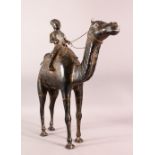 A LARGE INDIAN WHITE METAL MODEL OF A CAMEL AND RIDER, 46cm high, 46cm long.