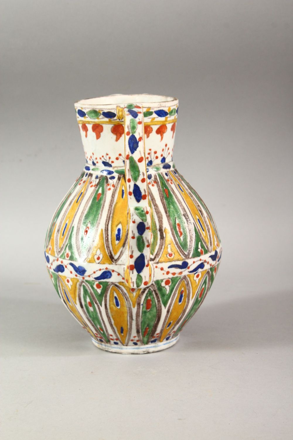 A TURKISH OTTOMAN KUTAHYA POTTERY POT - the body with multi coloured leaf shaped tendril with a - Image 4 of 6