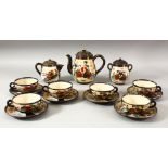 A JAPANESE SATSUMA TEA SET, comprising of one teapot and cover, milk jug and cover, sugar pot and