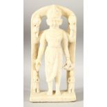 AN 18TH CENTURY INDIAN CARVED MARBLE FIGURE OF A MUTLI ARM DEITY, standing beneath an archway, 29.