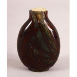 A CHINESE HARDSTONE / GLASS SNUFF BOTTLE - with varied colour decoration, 6cm