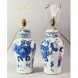 A PAIR OF CHINESE BLUE AND WHITE PORCELAIN JARS AND COVERS converted to lamps, both decorated with