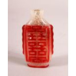 A CHINESE OVERLAY FROSTED GLASS SNUFF BOTTLE - overlaid in red with calligraphy, 6.5cm
