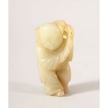 A SMALL CHINESE CARVED JADE FIGURE OF A BOY, possibly Ming Dynasty, 5.5cm high.