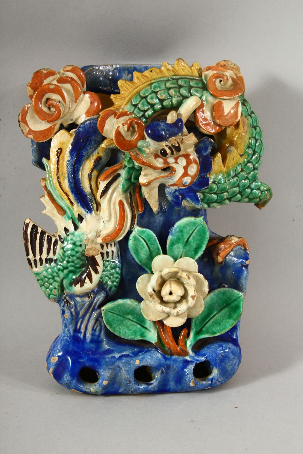 TWO CHINESE POLYCHROME POTTERY WALL POCKETS, carved with a shrine and flora with ducks / birds, 20cm - Image 2 of 7