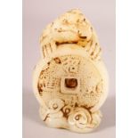 A CHINESE CARVED JADE TOAD & CURRENCY FIGURE, the toad stood holding a coin, 10cm high