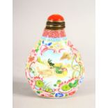A CHINESE ENAMEL SNUFF BOTTLE and hardstone stopper, painted with panels of birds, 8cm high.