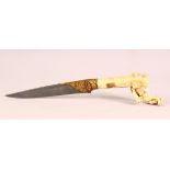 A GOOD INDIAN CARVED BONE & INLAID WATERED STEEL DAGGER, the hilt formed as an elephant from
