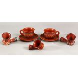 A MIXED LOT OF TURKISH TOPHANE POTTERY - comprising 2 x cup & saucers plus 3 x pipes.