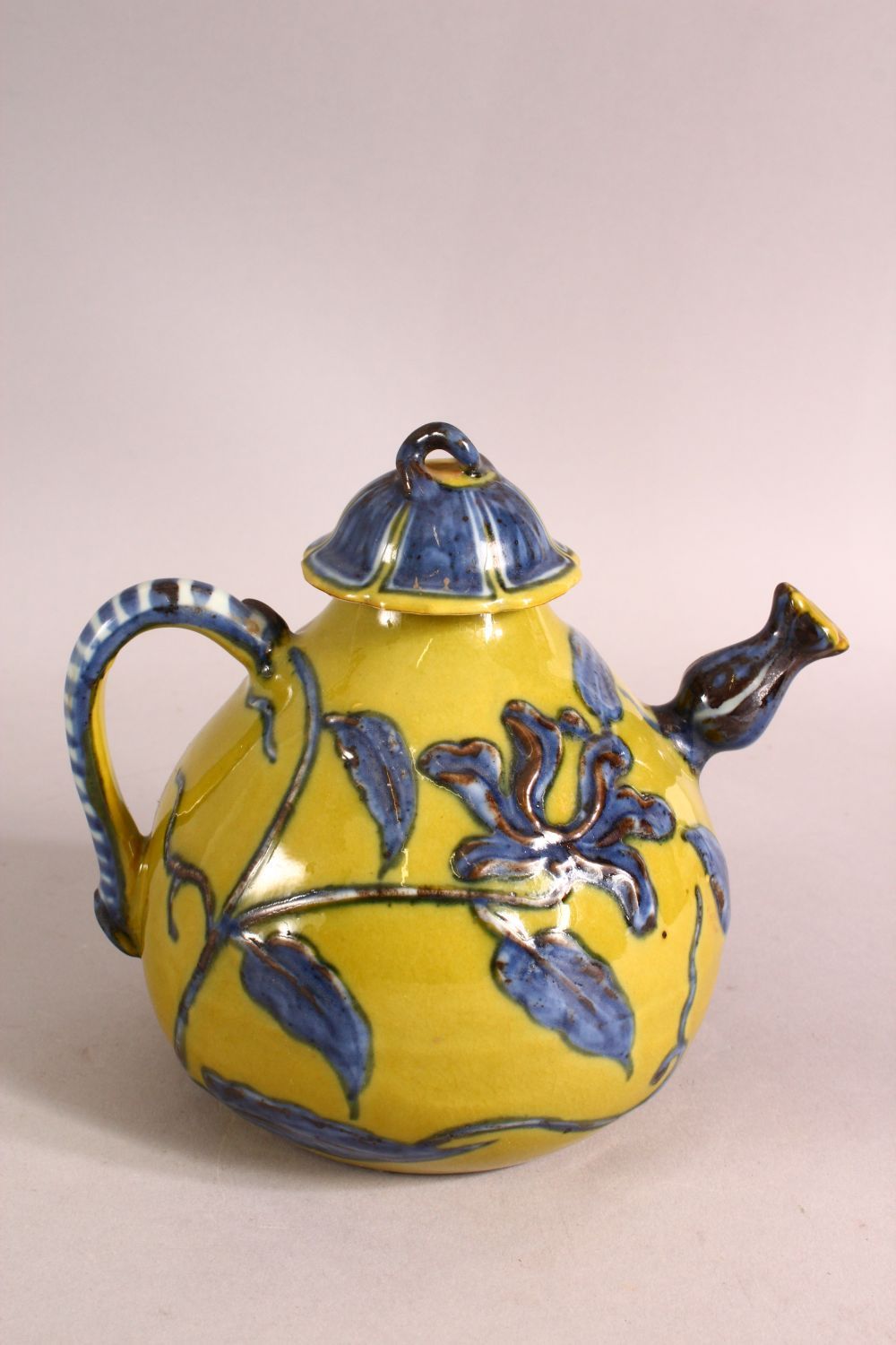 A CHINESE YELLOW GROUND GLAZED POTTERY TEAPOT AND COVER, the body with blue floral decoration, - Image 3 of 6