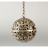 A CHINESE WHITE METAL / POSSIBLY SILVER SPHERICAL TRAVELLING INCENSE BURNER on chain, 5cm.